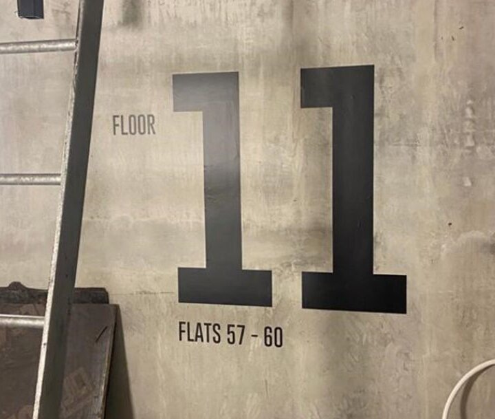 Signage vinyl lettering on wall showing floor number