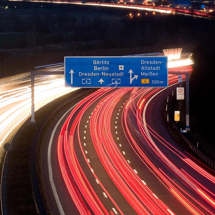 german road signs with reflective vinyl at night